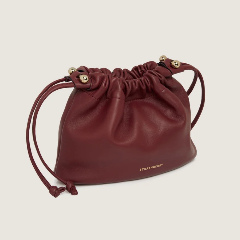 Strathberry Charlotte Leather Drawstring bag in Oxblood